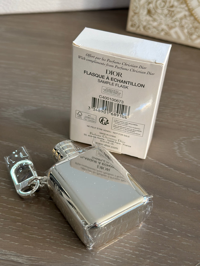Dior Sauvage fragrance charm or pendant