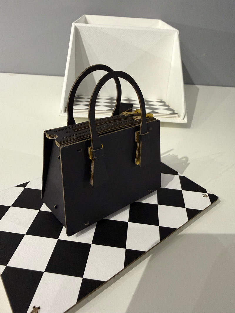 Miniature papercraft sculpture of the iconic Prada Galleria Bag
