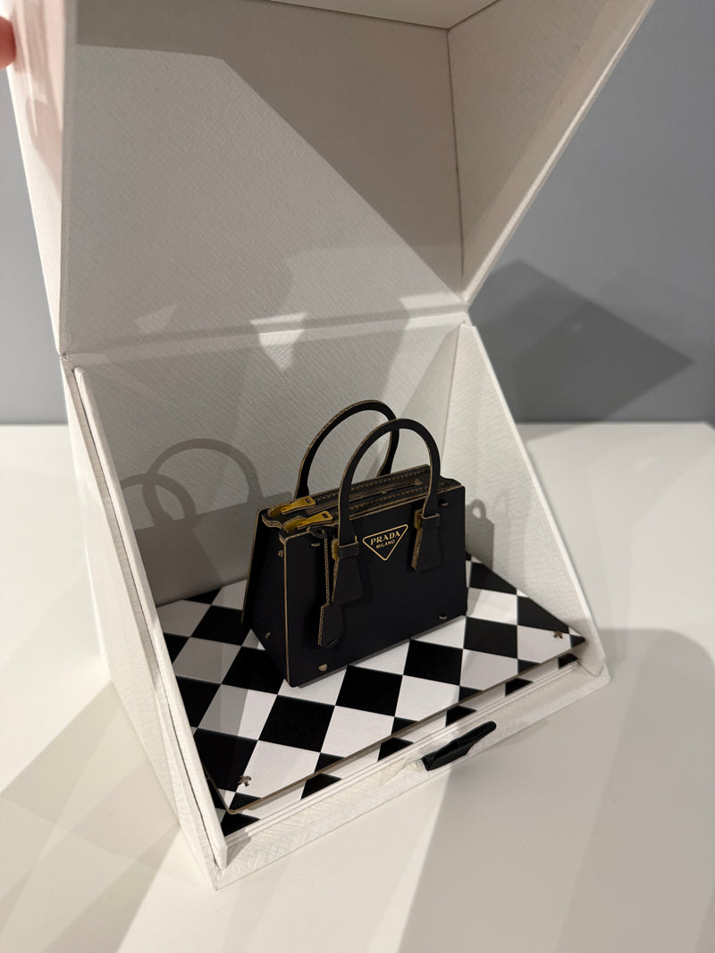 Miniature papercraft sculpture of the iconic Prada Galleria Bag