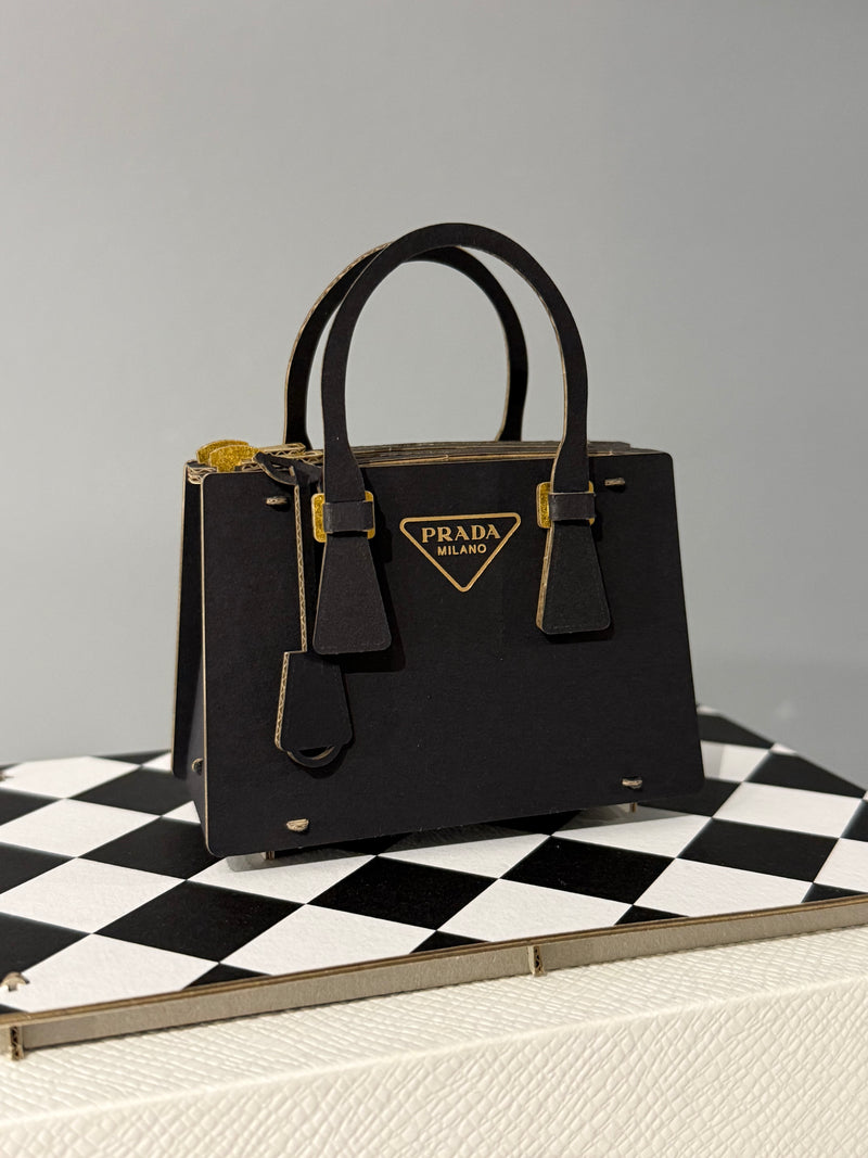 Miniature papercraft sculpture of the iconic Prada Galleria Bag